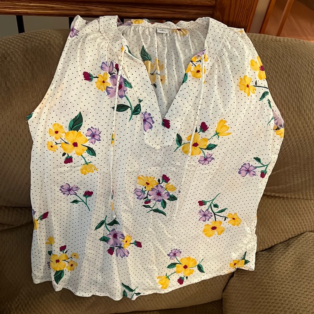 Sleeveless white with flower print blouse